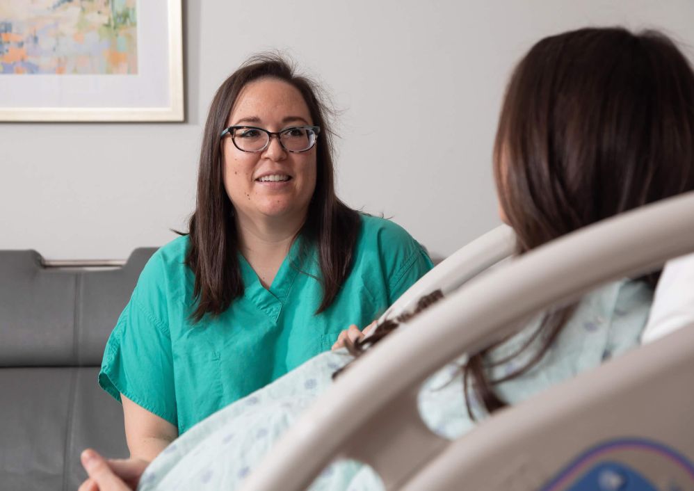 Nicolette P. Holliday, M.D., F.A.C.O.G., meets with a patient.