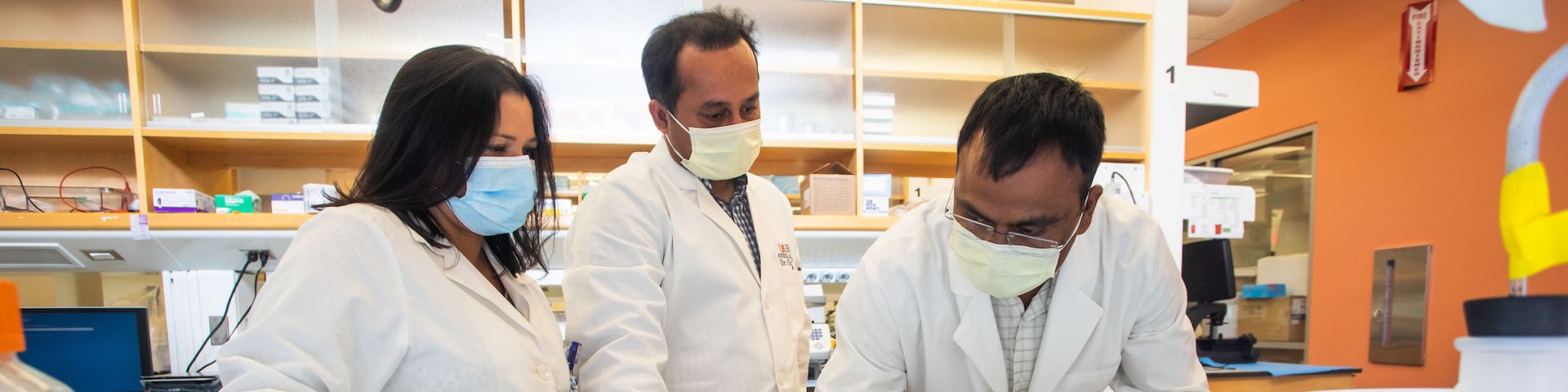 From left, Chandrani Sarkar, Ph.D., Debanjan Chakroborty, Ph.D., and Sandeep Goswami, Ph.D., are studying a potential therapeutic target for advanced colon cancer at the Mitchell Cancer Institute.