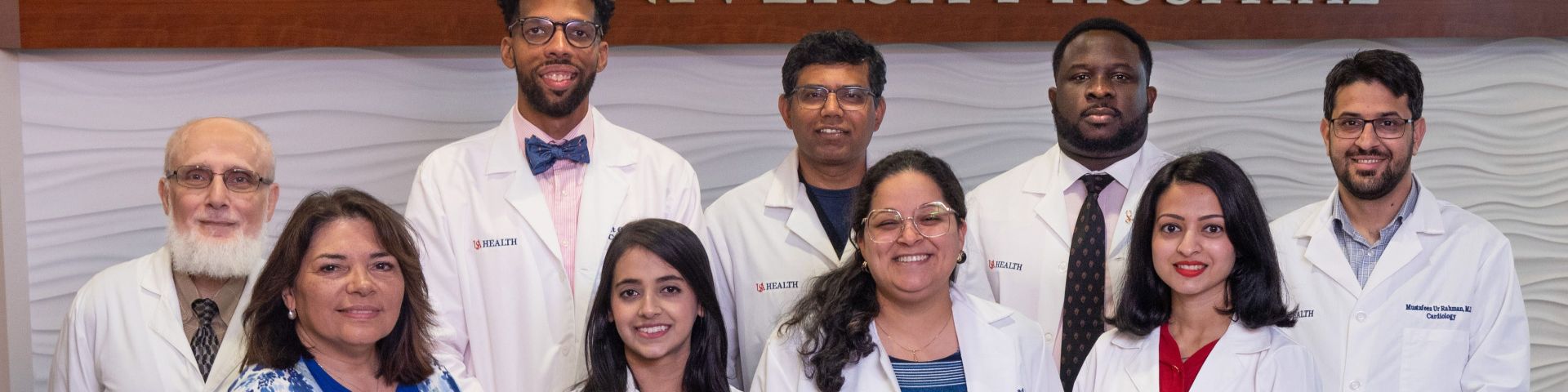 Cardiologists stand in the lobby of USA Health University Hospital.
