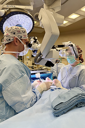 Nicholas A. Deebel, M.D., performs a microsurgery vasectomy reversal.