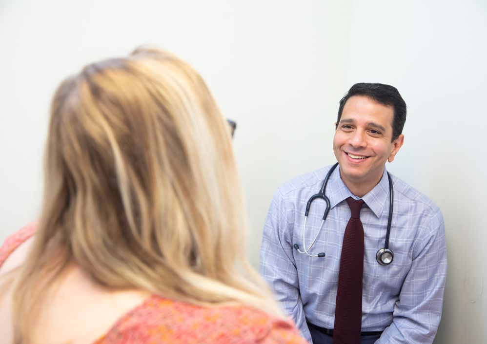 Ehab A. Molokhia, M.D., sees a patient at the Family Medicine Center.
