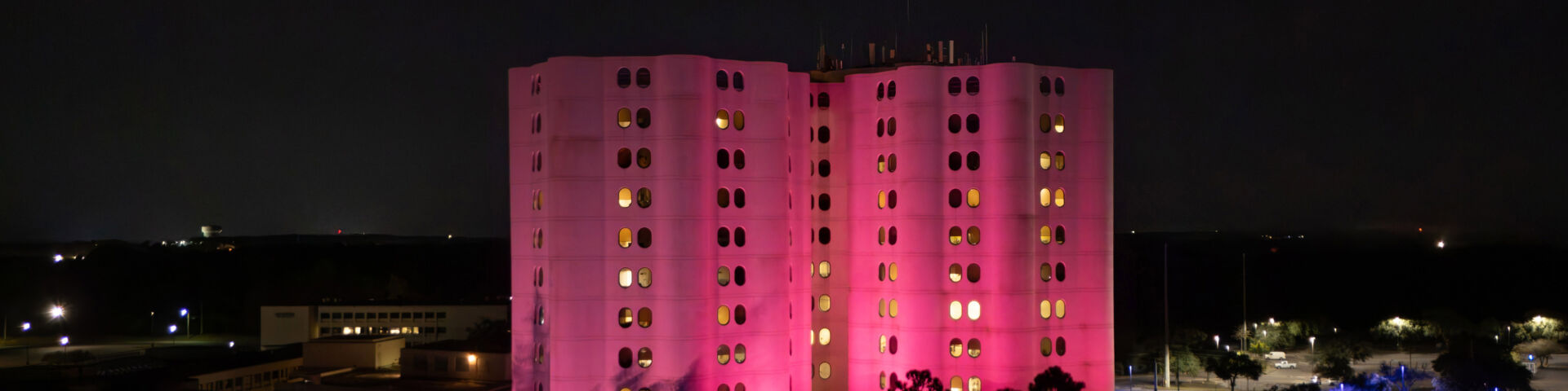 Providence Hospital is illuminated in pink to observe Breast Cancer Awareness Month.