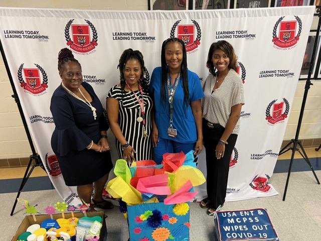 Physicians Group clinics collected wipes, sprays and other cleaning supplies to donate to three local schools.