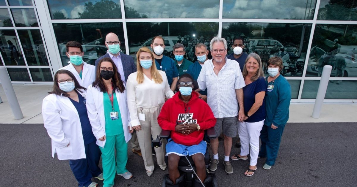 Family donates new electric wheelchair to former USA Health patient