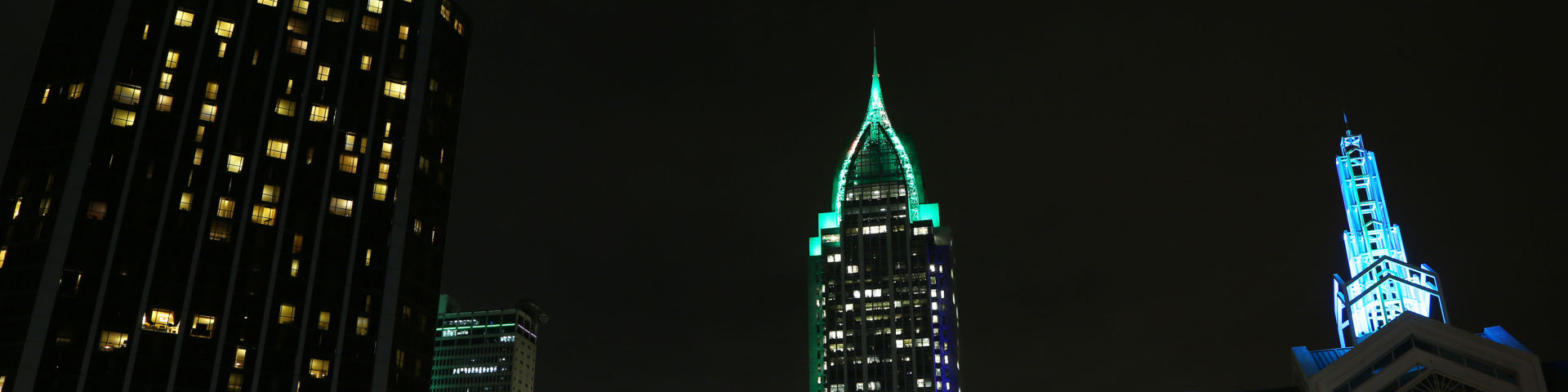 The RSA Tower in Mobile is lit in teal for cervical cancer awareness on Jan. 17, 2019.