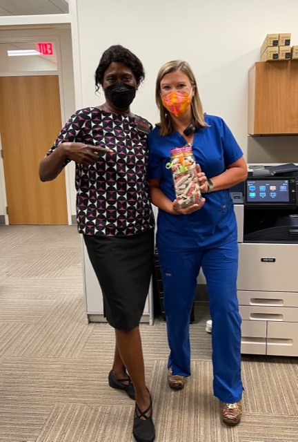 Alison Mayfield, R.N., a nurse in pediatrics gastroenterology, came in first place, winning the jar of 37 candy bars