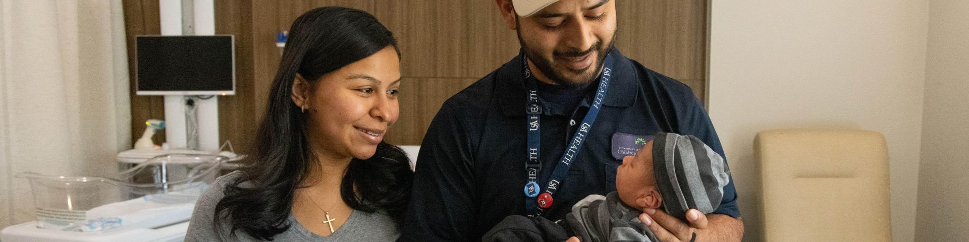 Zaira Estrada and Lucio Cruz hold their newborn son, Alexander